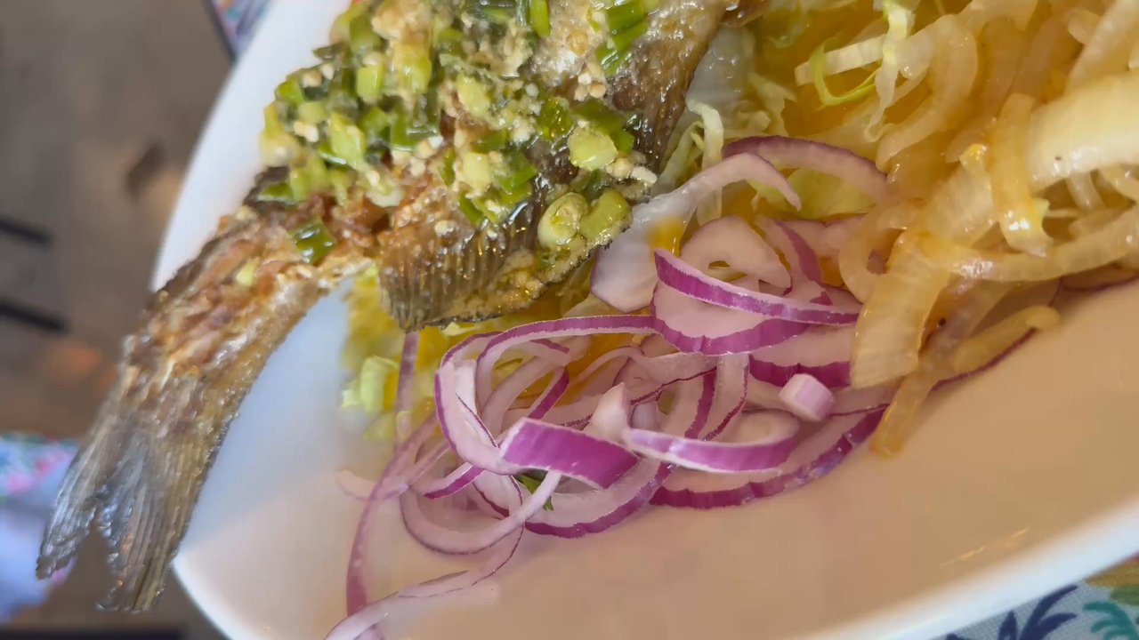 Super Antojitos - El Bagre covered in garlic and green onions. - Mexican Near Me - Orange, California