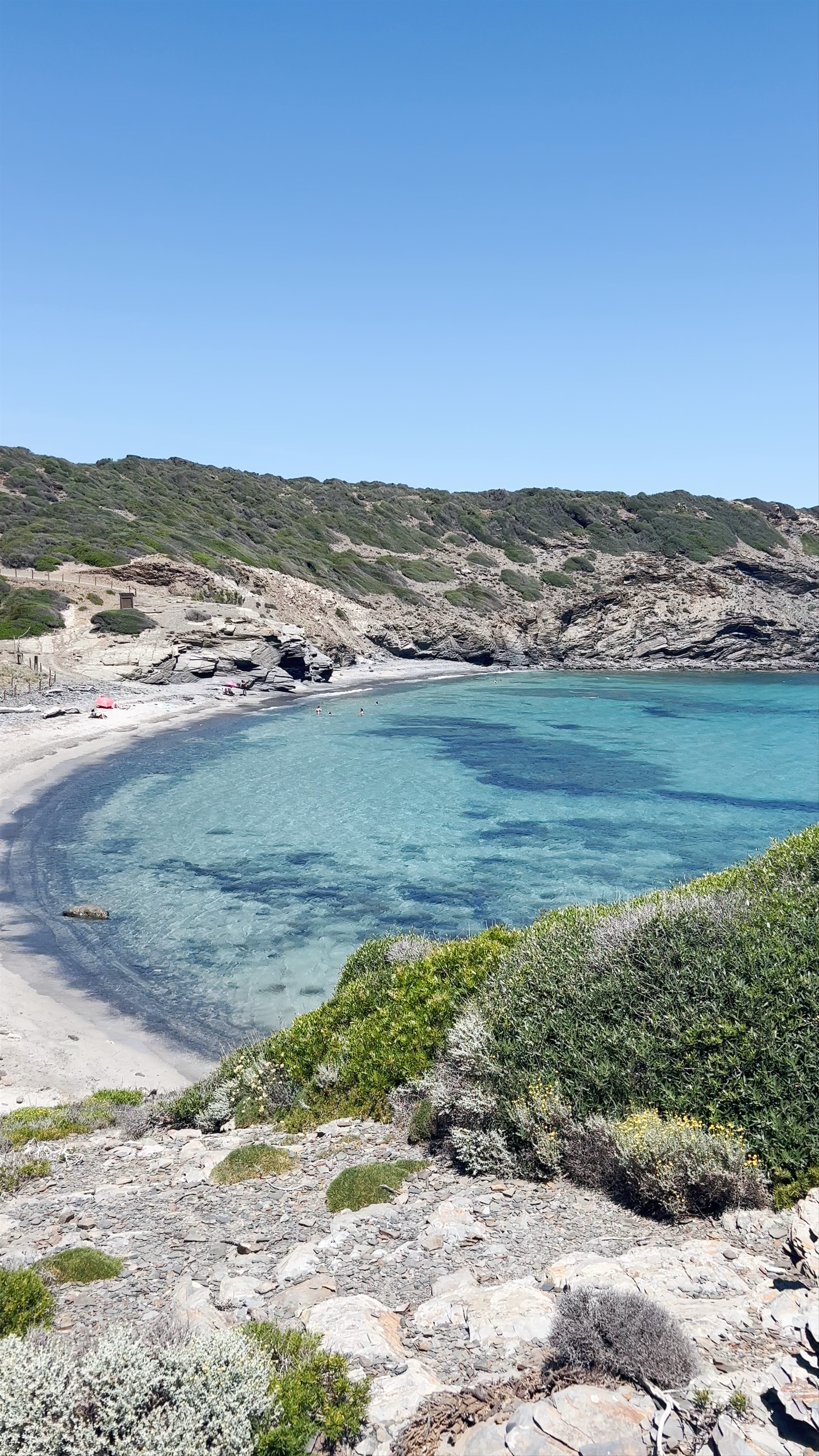 Cala Presili: Crystal Clear Waters and Untamed Coastline in Mahón
