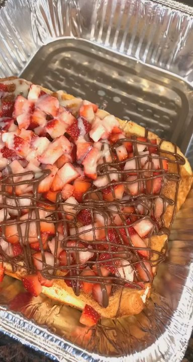 Tacos yo Mama - Prepared churro cheesecake with strawberries, lechera(condensed milk) and Nutella - Tacos Near Me