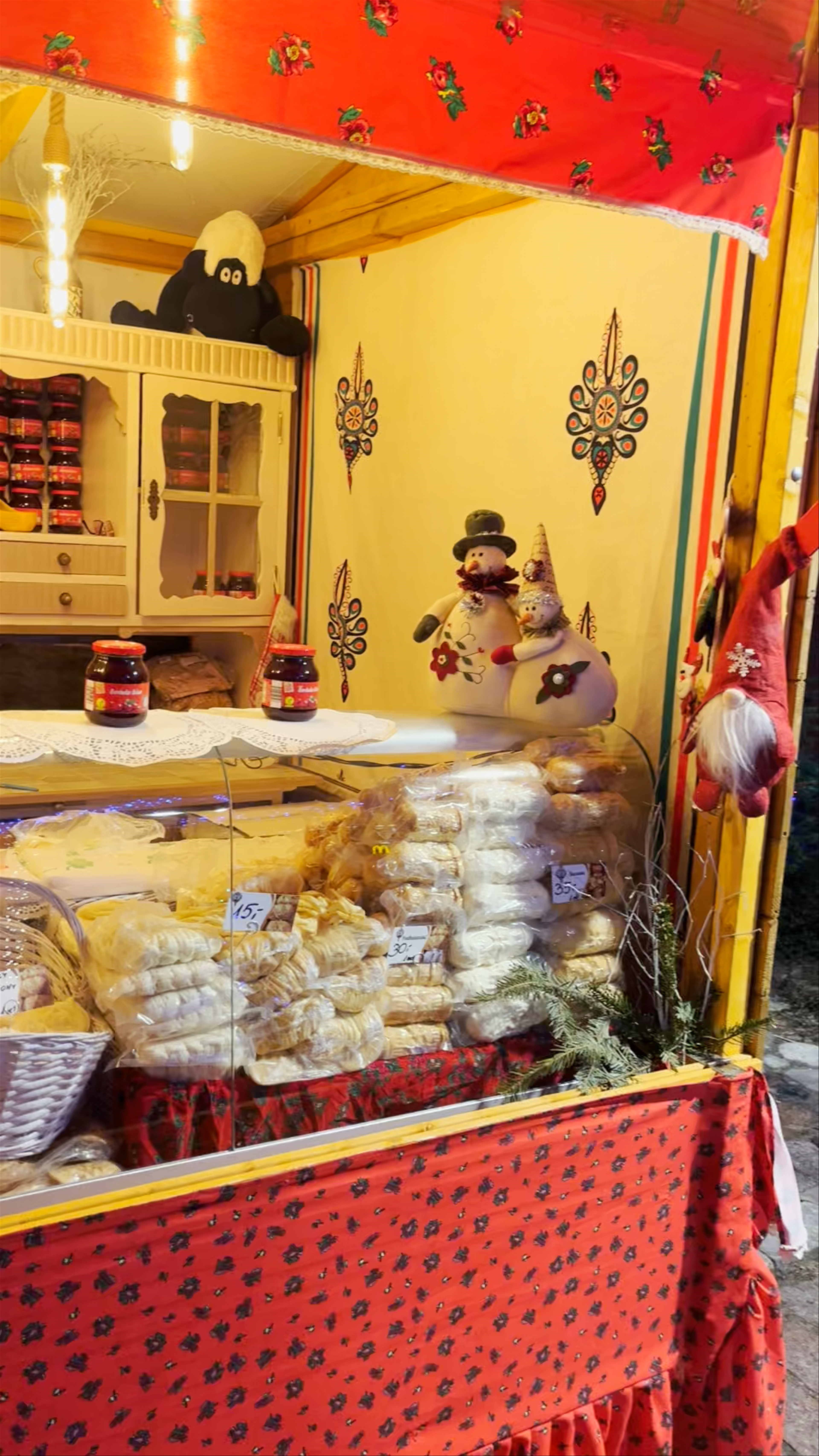 Winter Holiday Market in Warsaw at Jan Zachwatowic Memorial Statue