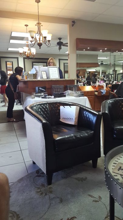 A Better Cut Salon - Lisa checking out her customer. - Nail Salons Near Me - West Palm Beach, Florida