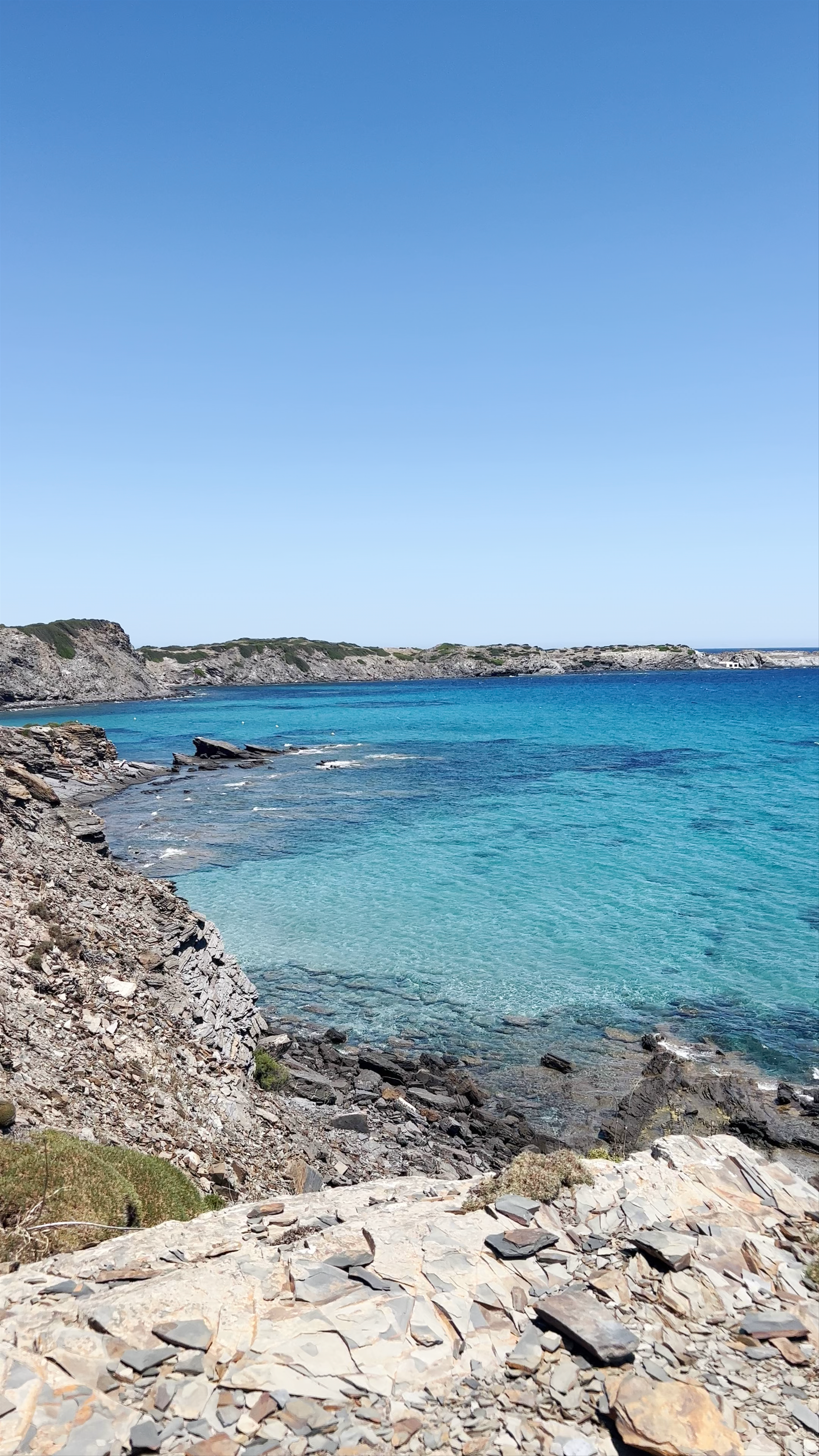 Crystal Clear Waters at Cala Presili, Mahón