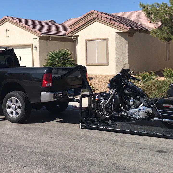 Stu's Motorcycle Towing - Stu putting my Harley on his truck. Very efficient. - Towing Near Me - Las Vegas, Nevada