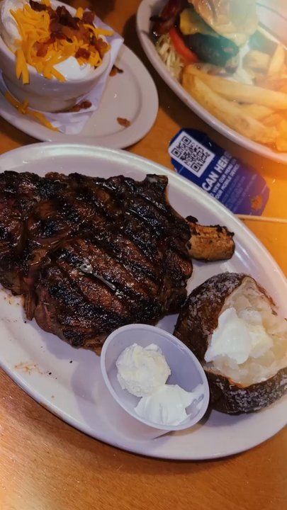 Texas Roadhouse - Delicious mouth watering Bone-In Ribeye*. Baked Potato. My boyfriend loves the All-American Cheeseburger*! - Barbeque Near Me - El Paso, Texas