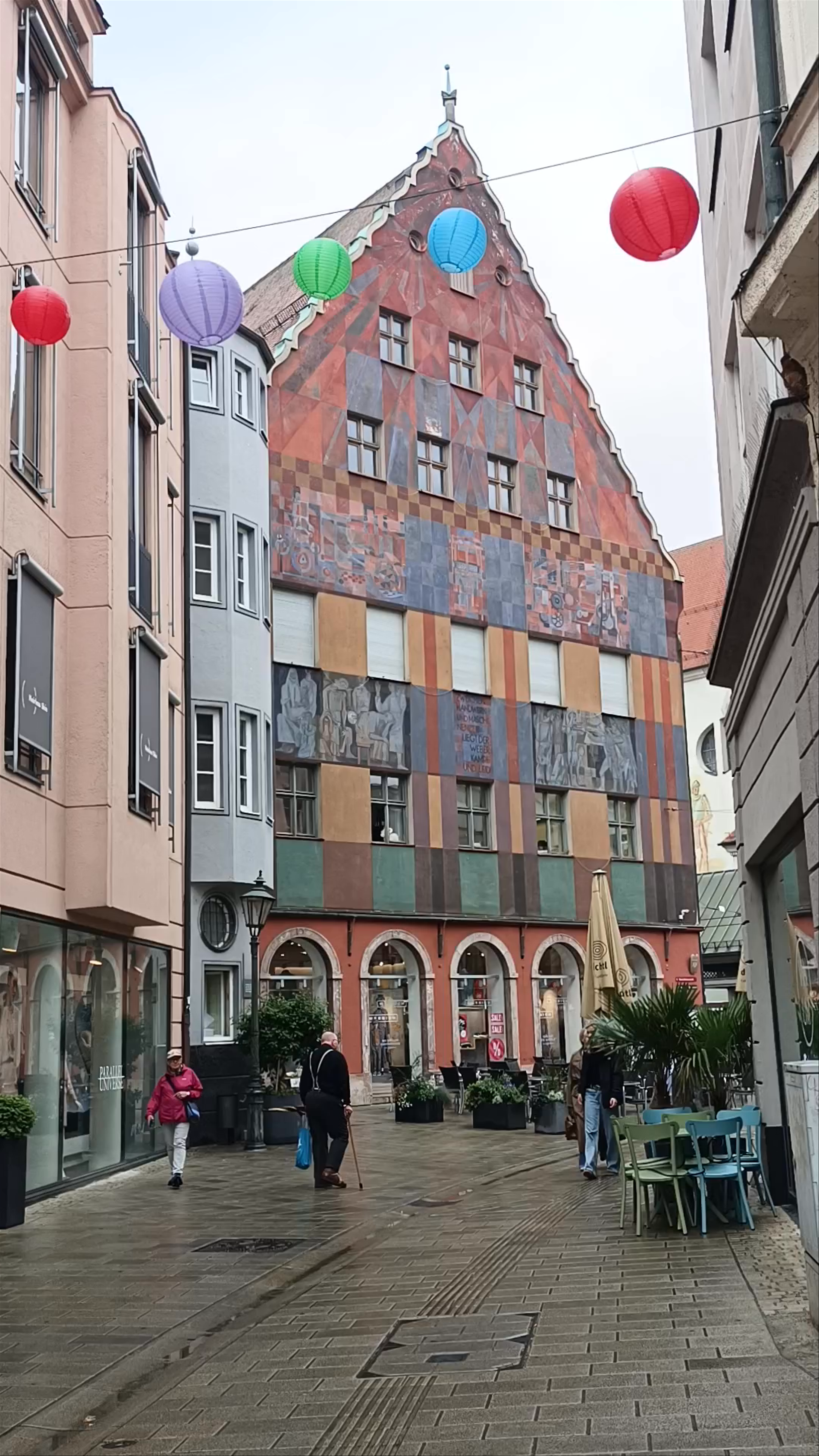 Strolling Through Weberhaus Augsburg's Colorful Historic Alley