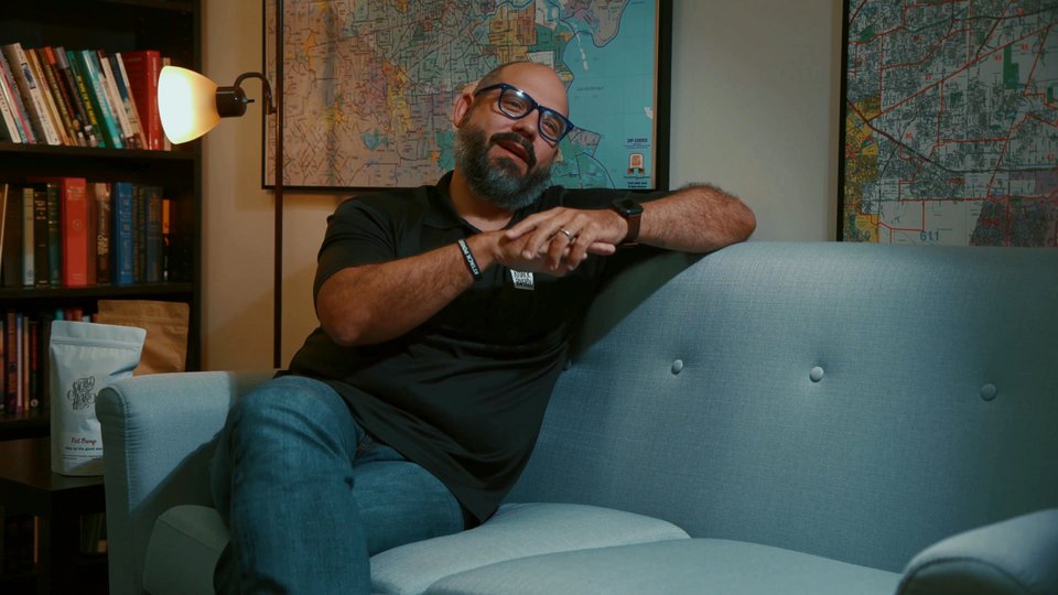 Interview still from the Attack Poverty brand film