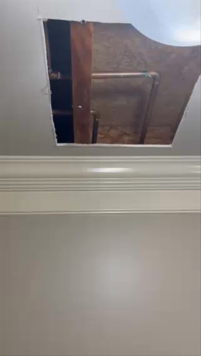 Premier Home Pros - View from ceiling of bathroom below of improperly installed drain - General Contractors Near Me - North Canton, Ohio