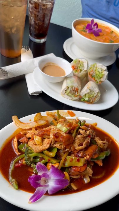 Mon Thai - Spring rolls, cashew stir-fry, sides of rice, crab Rangoon, and panang curry - Thai Near Me - Denver, Colorado