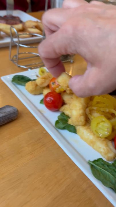 Saltwater Grill - Calamari arrived to our table like this, an hour and fifteen minutes after having been ordered.  Sad. - Seafood Near Me - New Bern, North Carolina