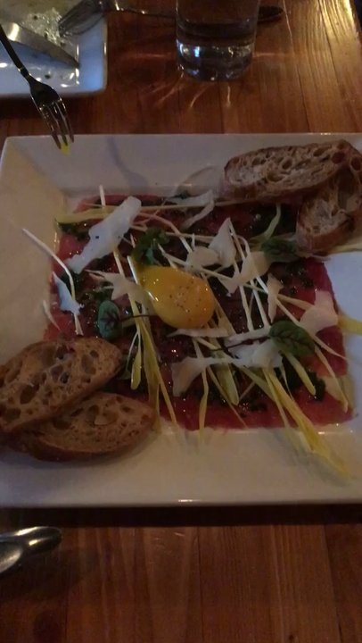 Pig in a Fur Coat - Reverse egg poke of lamb Lamb Carpaccio - New American Near Me - Madison, Wisconsin