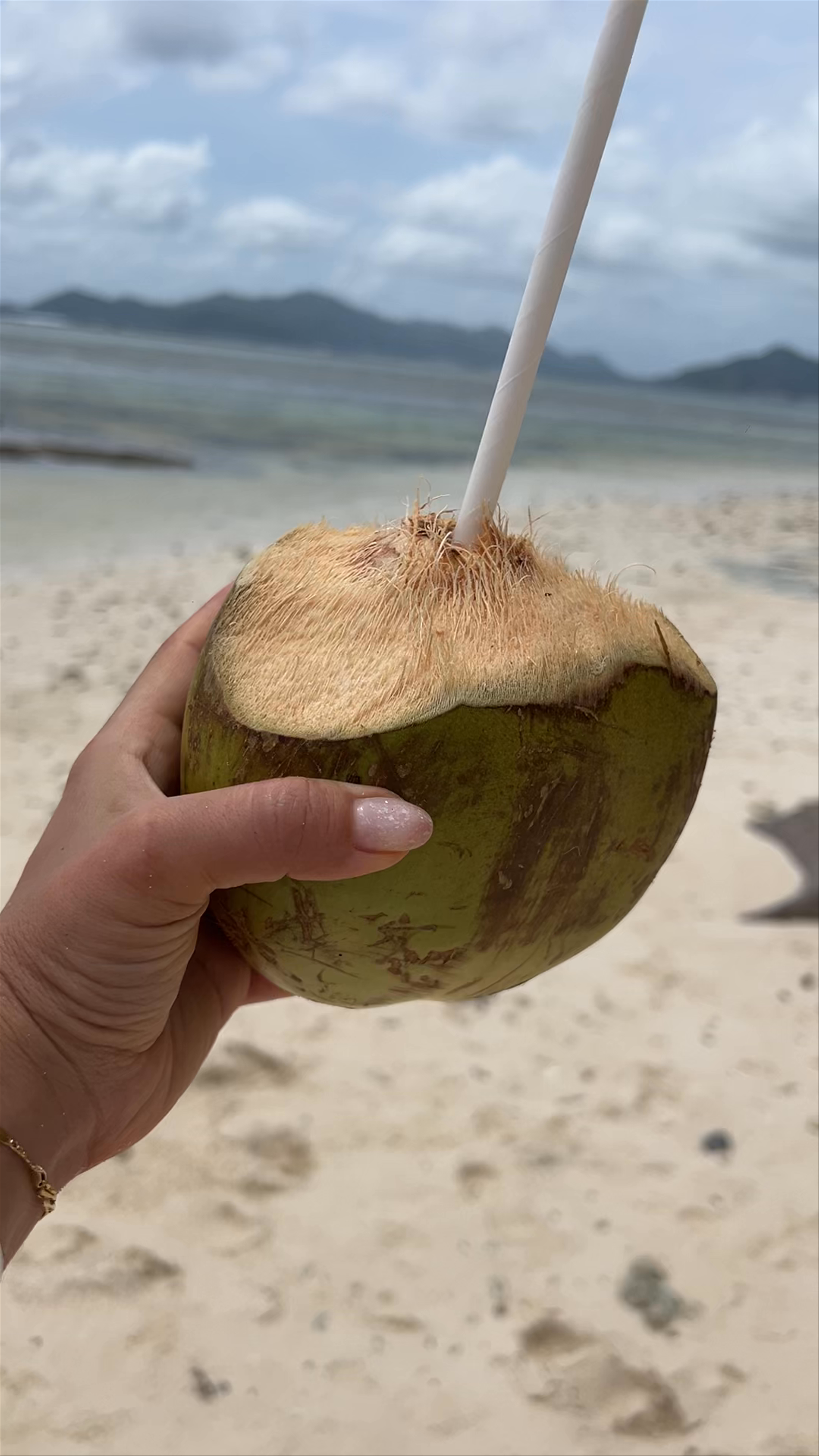 Refreshing Coconut Bliss at Anse Source d'Argent, Seychelles