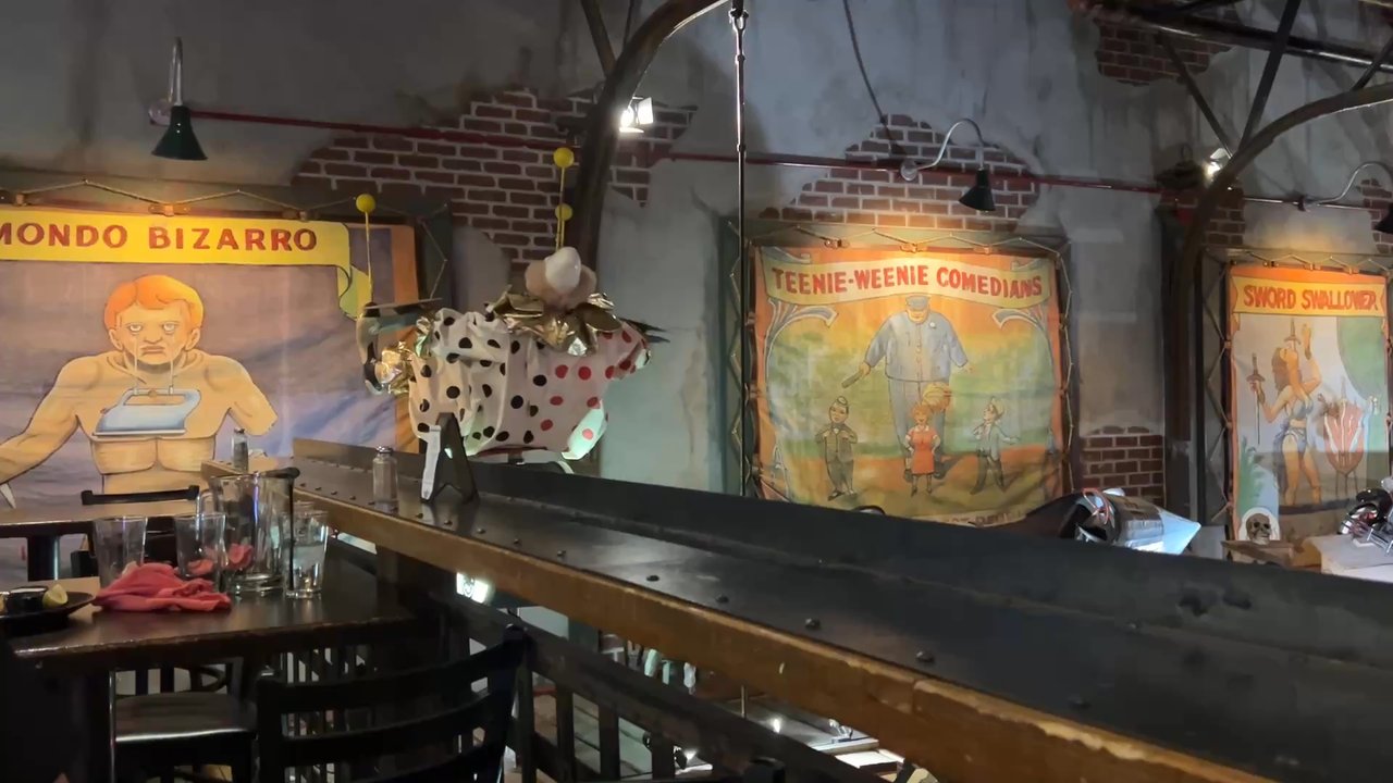Strap Tank Brewery - This rotating clown is the stuff of nightmares.... - New American Near Me - Lehi, Utah