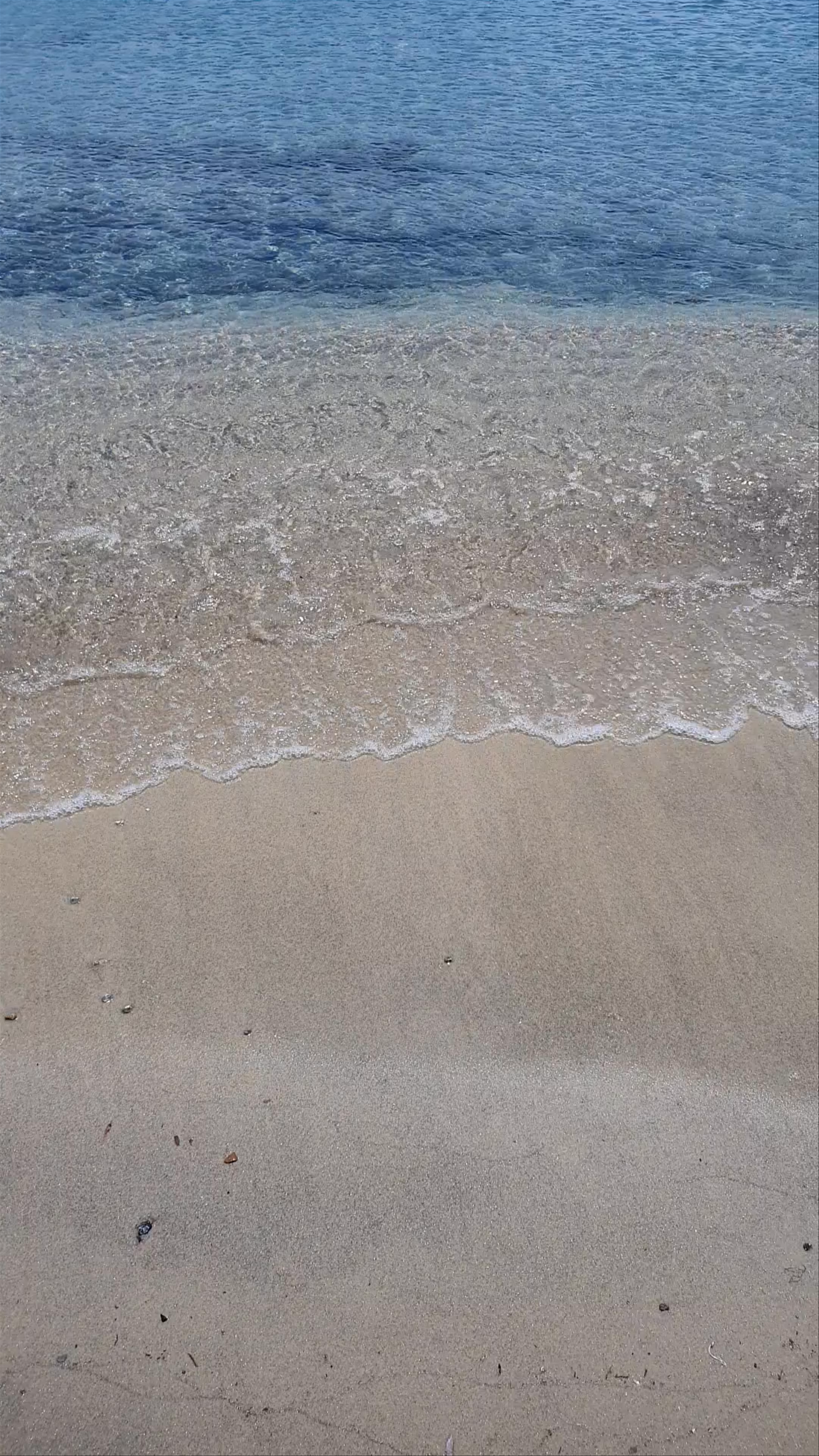 Ornos Beach: Serene Shorelines in Mykonos, Greece