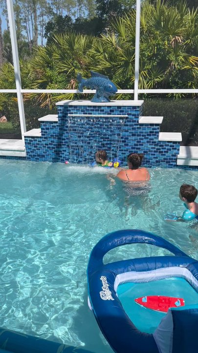 Platinum Pools SRQ - Fun in the waterfall! - Pool & Hot Tub Service Near Me - Sarasota, Florida