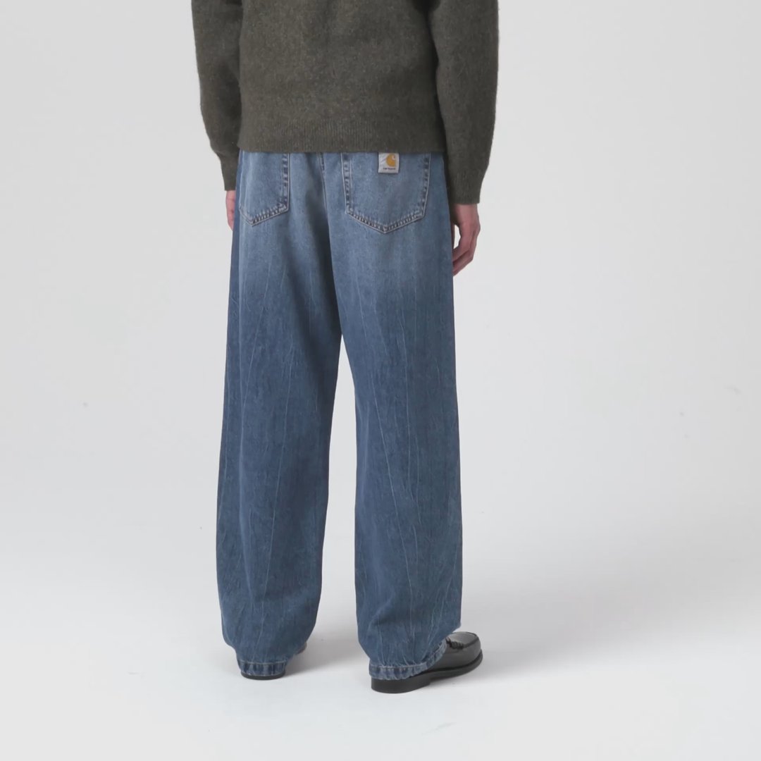 Model wearing a pair of Landon Pants in Marble Wash