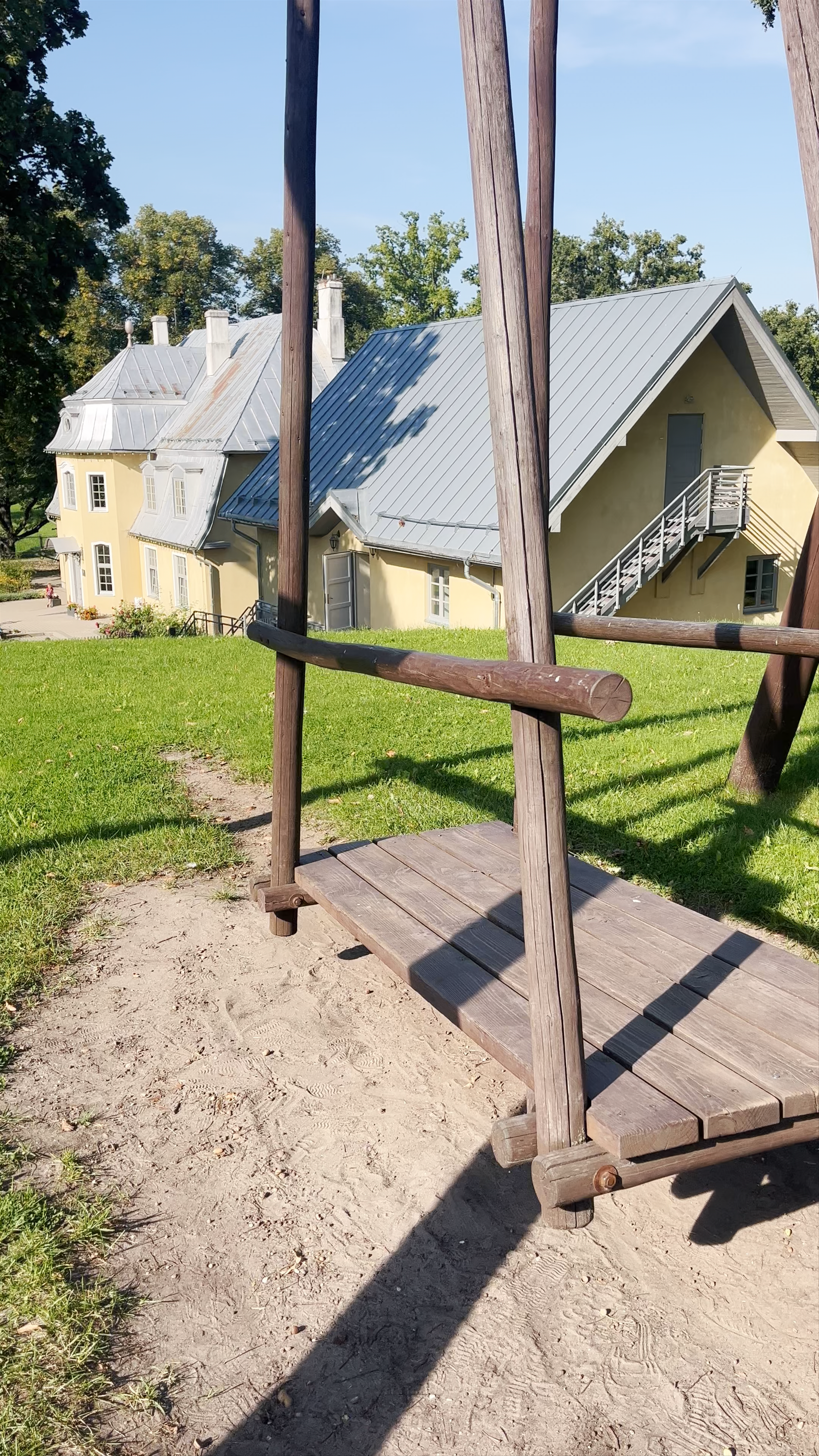 Tīnūžu muiža: Historic Latvian Manor Charm on a Sunny Day