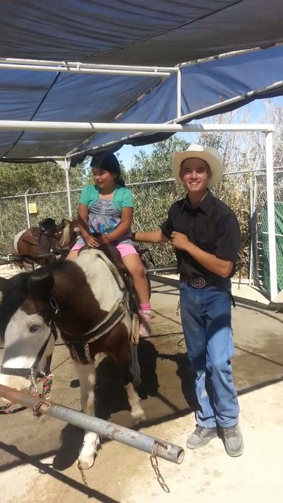 Giddy Up Ranch - Our pony ride at the four points swap meet with our friendly staff member  daniel - Horseback Riding Near Me - Phelan, California