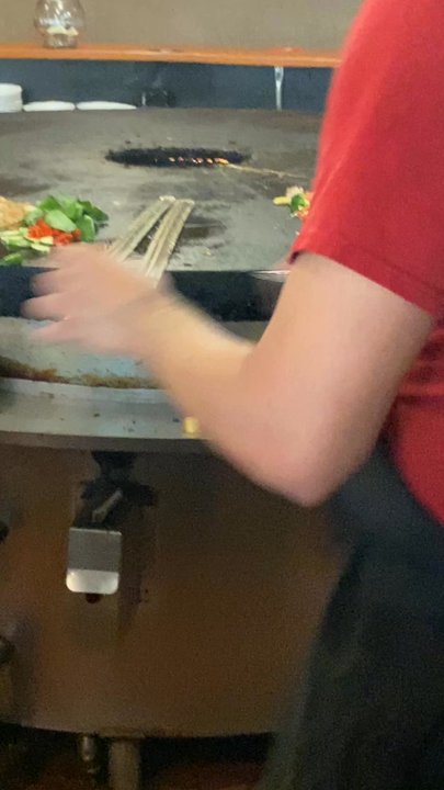 BD's Mongolian Grill - Finishing touches, then plating. Mmmm - Mongolian Near Me - Beavercreek, Ohio