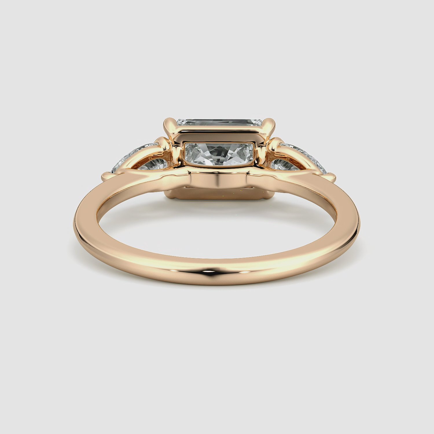 The Three Stone | Radiant | 14k | Rose Gold | bandAccent: Plain | diamondOrientation: horizontal | sideStoneCarat: 0.25ct | sideStoneShape: Pear | caratWeight: other