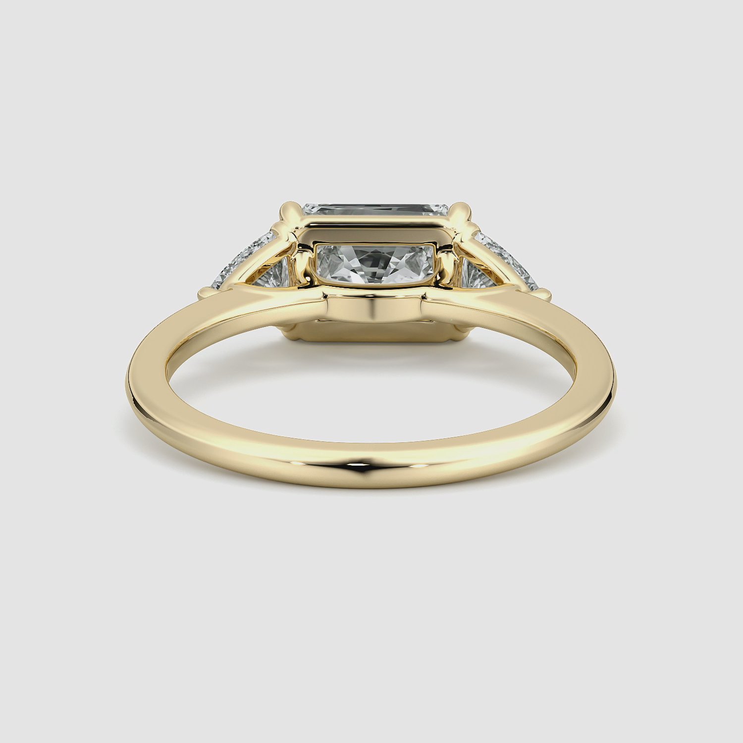 The Three Stone | Radiant | 18k | Yellow Gold | bandAccent: Plain | diamondOrientation: horizontal | sideStoneCarat: 0.25ct | sideStoneShape: Trillion | caratWeight: other