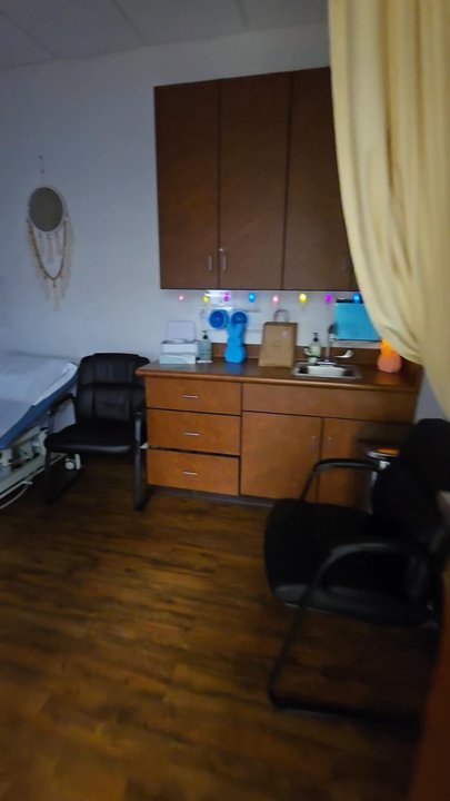 Temecula Valley OB/GYN - Ultrasound room with 70 inch screen to view and play area for children - Obstetricians & Gynecologists Near Me - Menifee, California