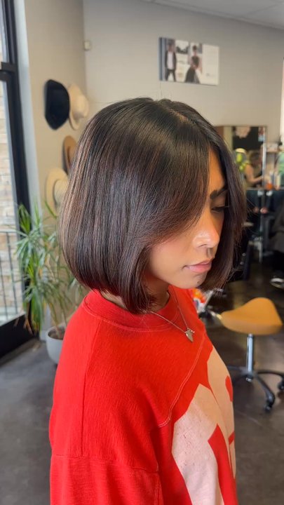 Sleek & Shear Salon - Fall warm brown highlights with short bob cut and curtain bangs - Hair Stylists Near Me - Murrieta, California