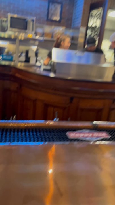 Shea's Lansdowne Streets - Staff Standing around chatting while I waited for service - Sports Bars Near Me - Naples, Florida