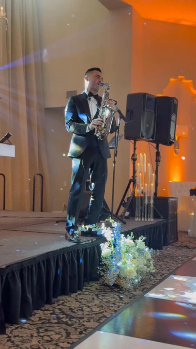 The Legacy Ballroom - The beautiful couple hired a saxophonist to play at their wedding. - Venues & Event Spaces Near Me - Phoenix, Arizona