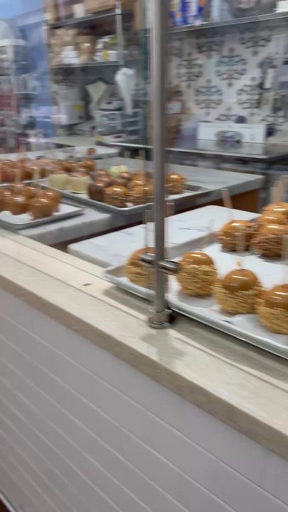 Kilwins Ice Cream - Chocolate - Fudge - Best Caramel Apple I have had in my life. Childhood memories flooded my brain as the apple flooded my tastebuds with joyyyyy - Candy Stores Near Me - Fort Collins, Colorado
