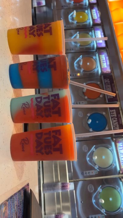 Fat Tuesday - 1. Mango strawberry 2. Eye candy and strawberry 3. Smurf drink 4. Mango strawberry - Cocktail Bars Near Me - Reno, Nevada