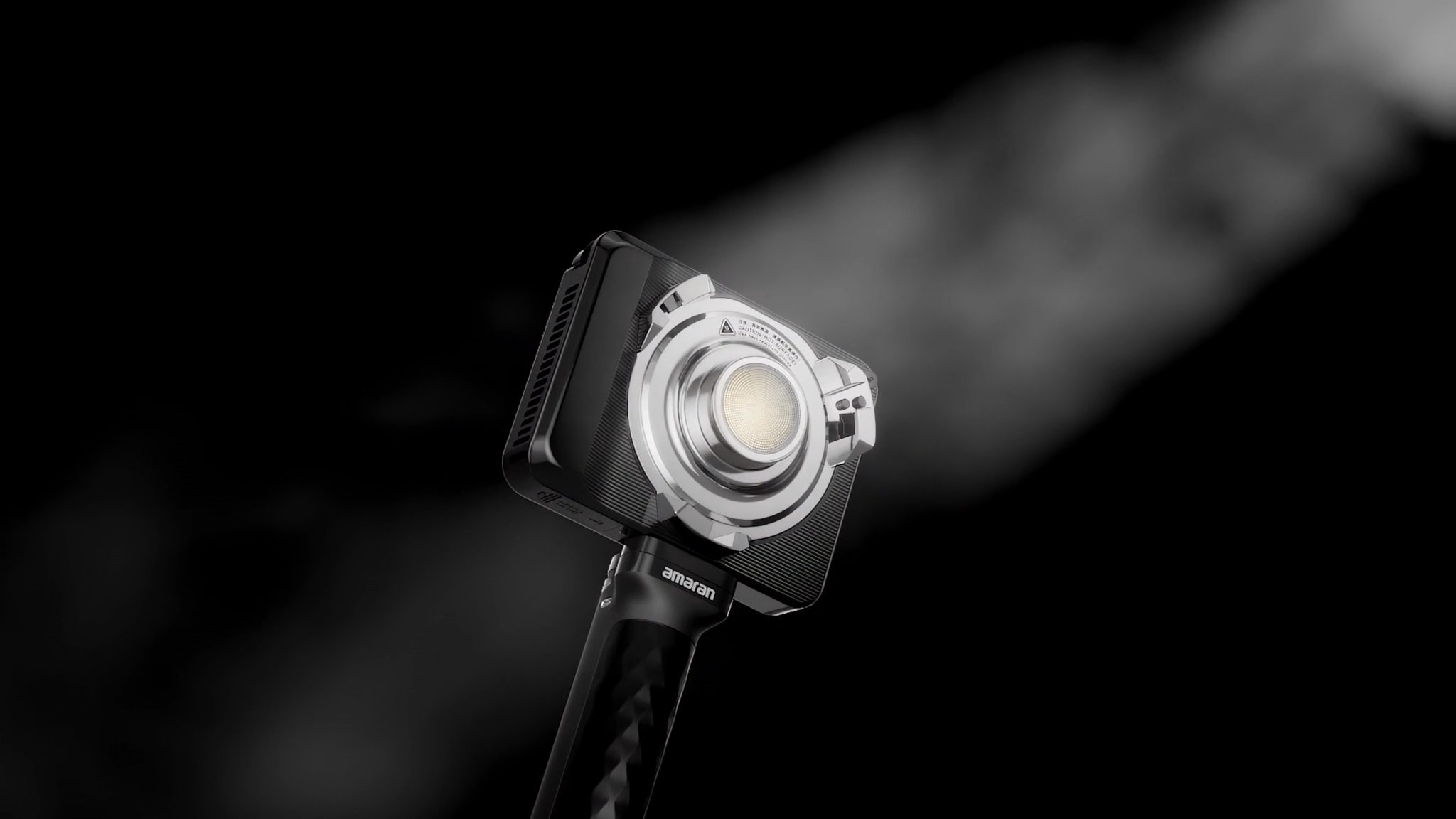 amaran Ray 60c with battery grip on a dark background