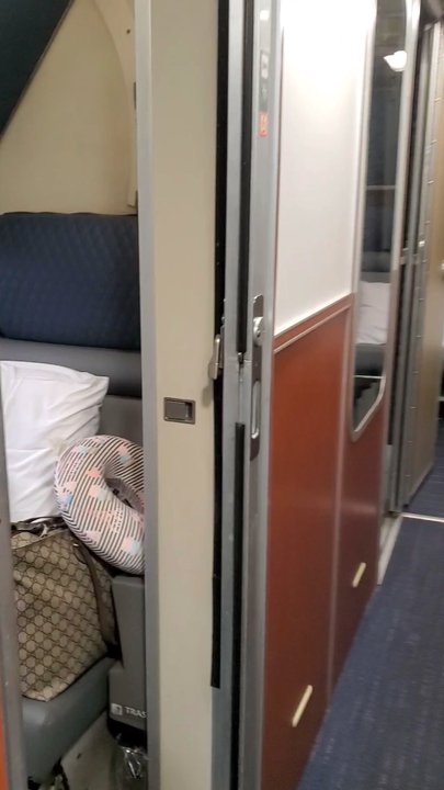 Amtrak - Small 2 passenger private room with seats that fold down for bed and bunk up top. - Trains Near Me - Seattle, Washington