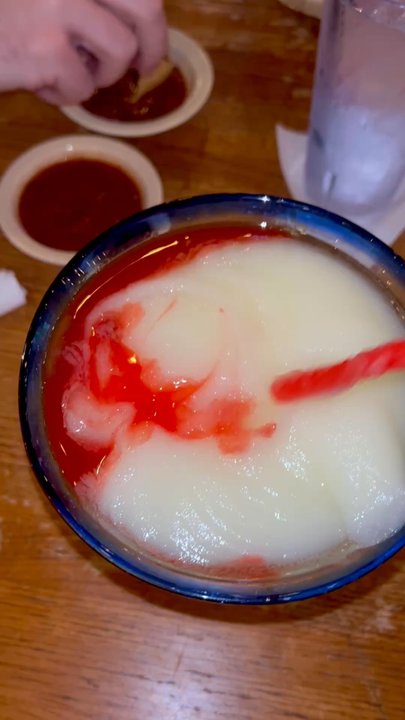 Baja Mex Grill - Strawberry frozen margarita. It's regular frozen marg with strawberry syrup - Mexican Near Me - Grapevine, Texas