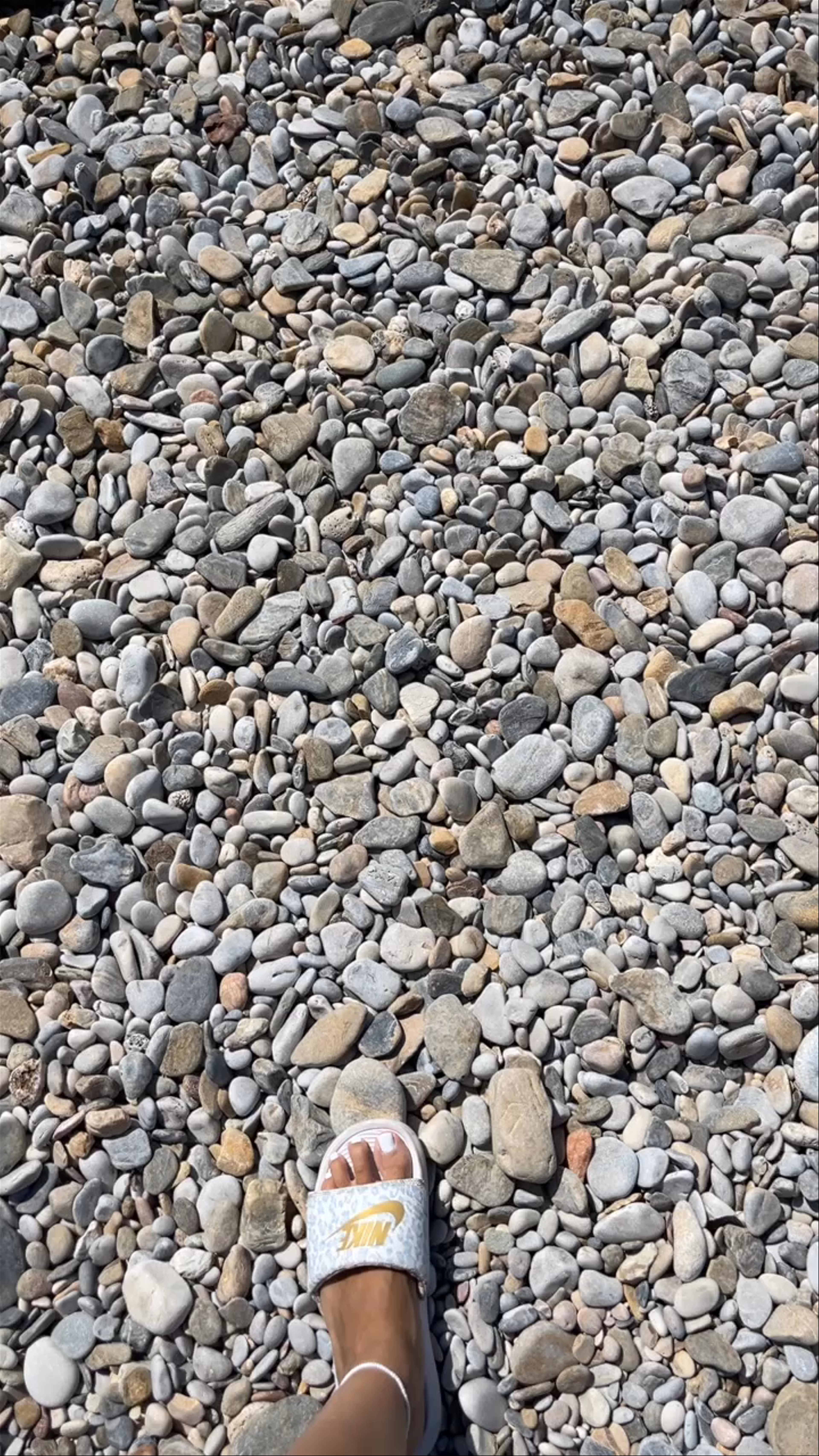 Sun-Kissed Pebble Beach at Agios Dimitrios, Greece