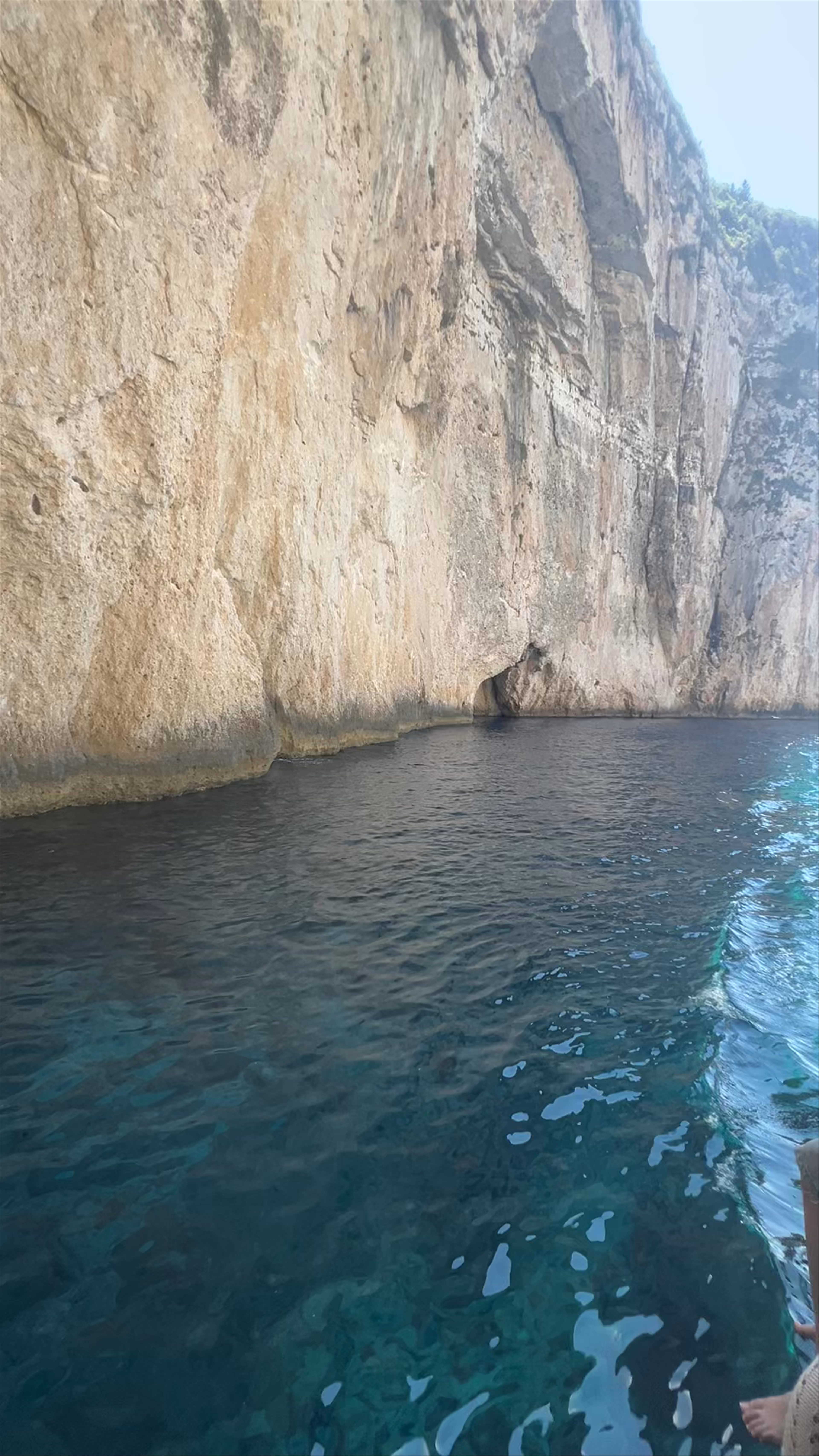 Ypapanti's Cave Boat Tour: Crystal Waters and Majestic Cliffs in Gaios, Greece