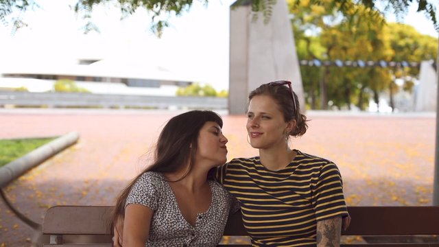 Lesbian couple on a bench