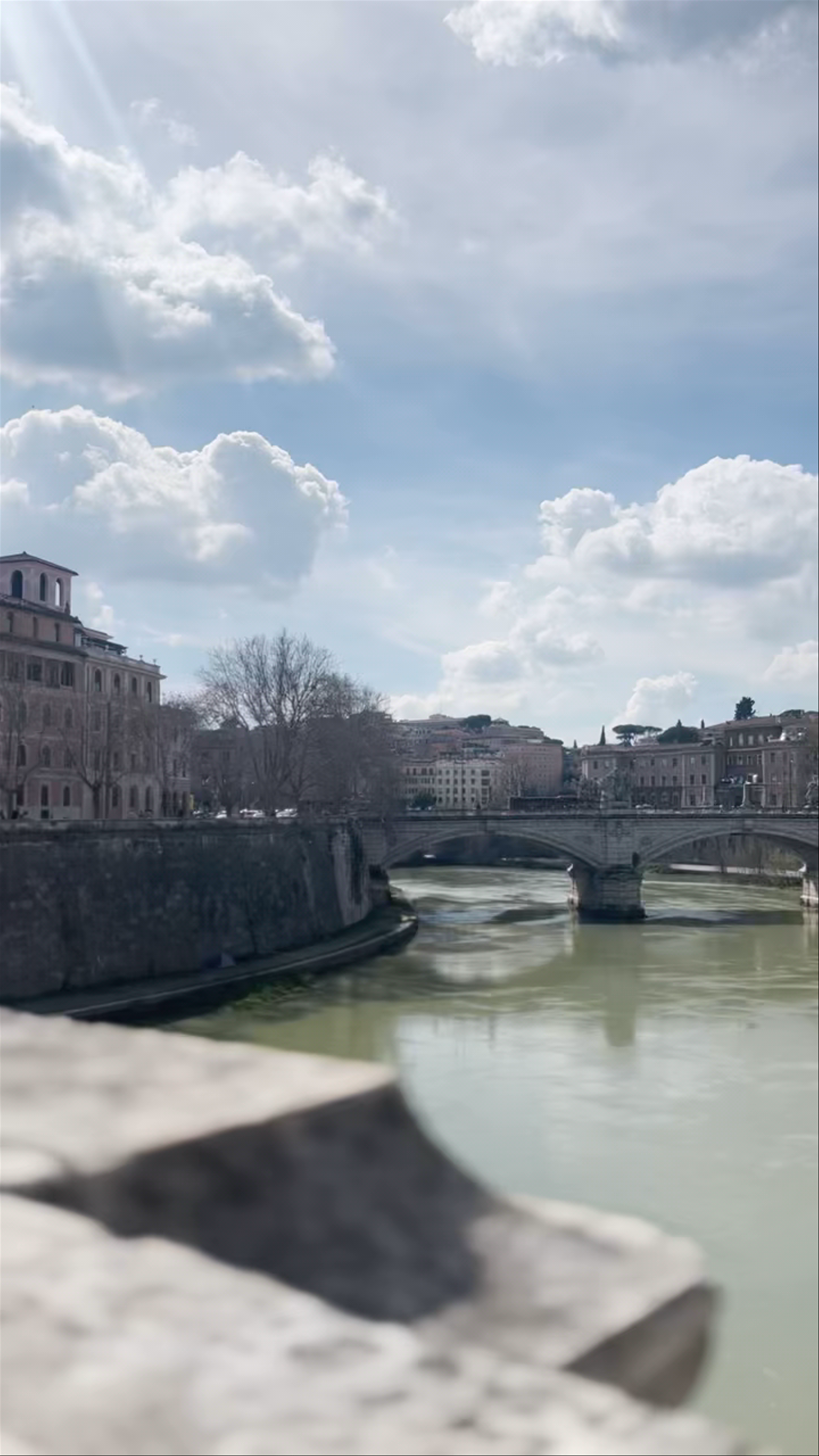 Angel's Bridge: Timeless Views Over the Tiber in Rome