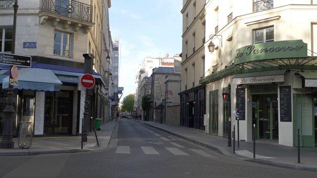 Walking on Rue De Bretagne street