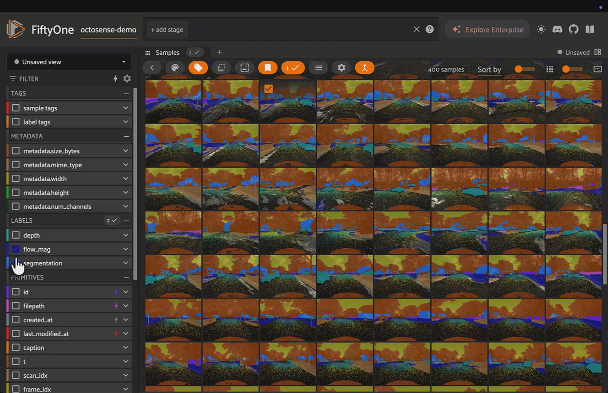 FiftyOne App grid of 400 OctoSense driving frames with a filter sidebar showing depth, flow_mag, and segmentation fields.