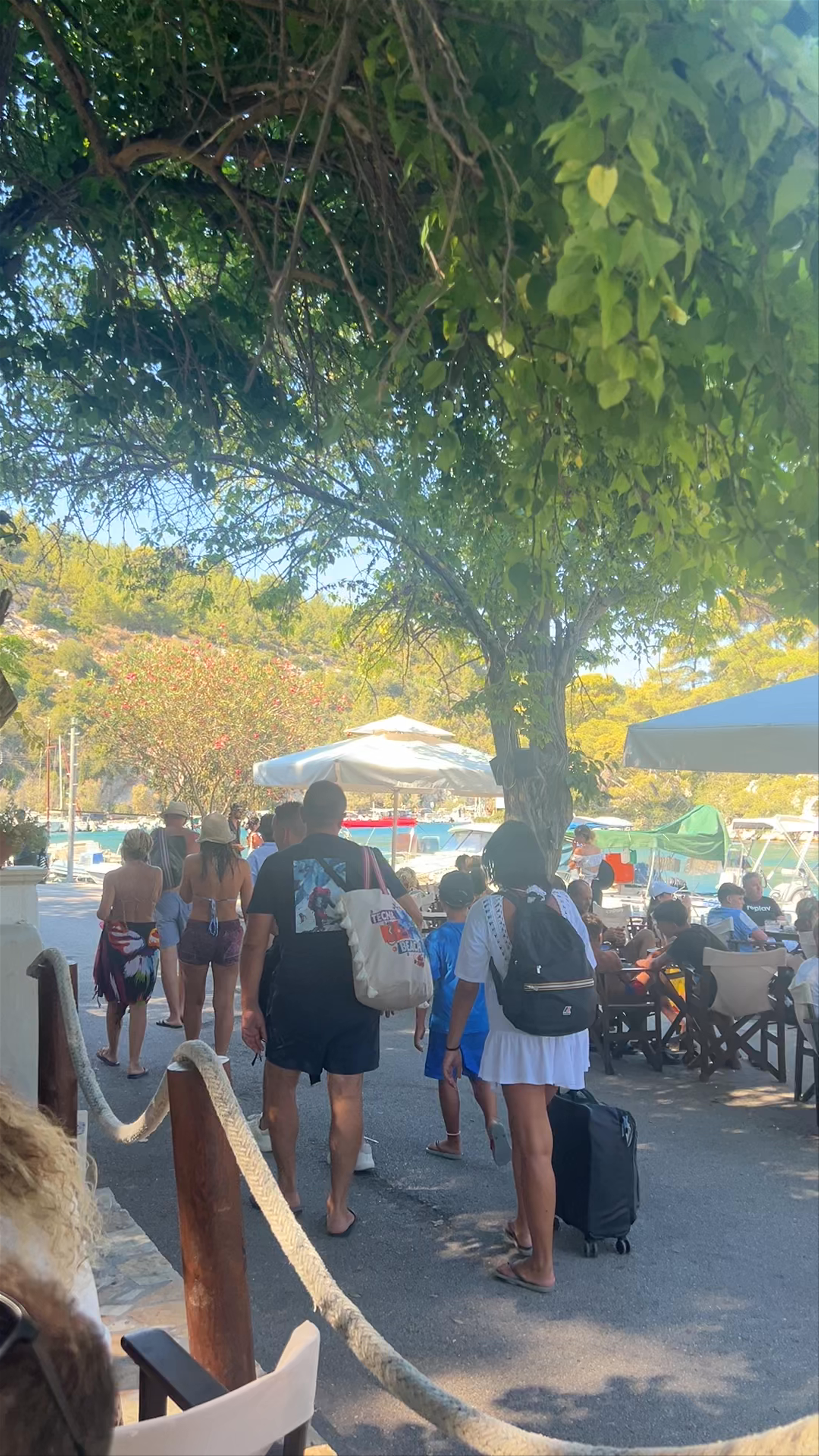 Sunlit Leisure at Porto Vecchio Harbor, Gaios, Greece