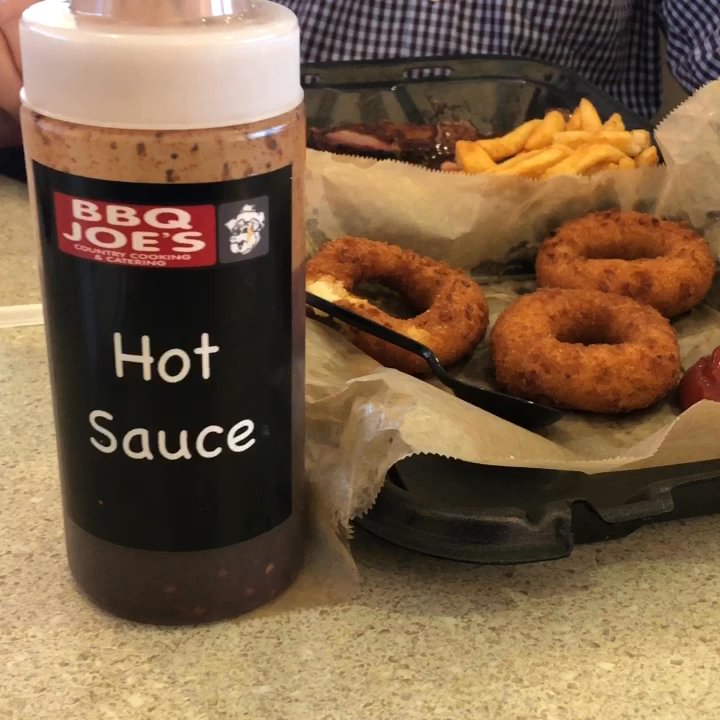 BBQ Joes - My brother-in-law kind of overdid the hot bbq sauce but looked brave eating it. - Barbeque Near Me - Trinity, North Carolina