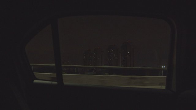 Night city from a moving car