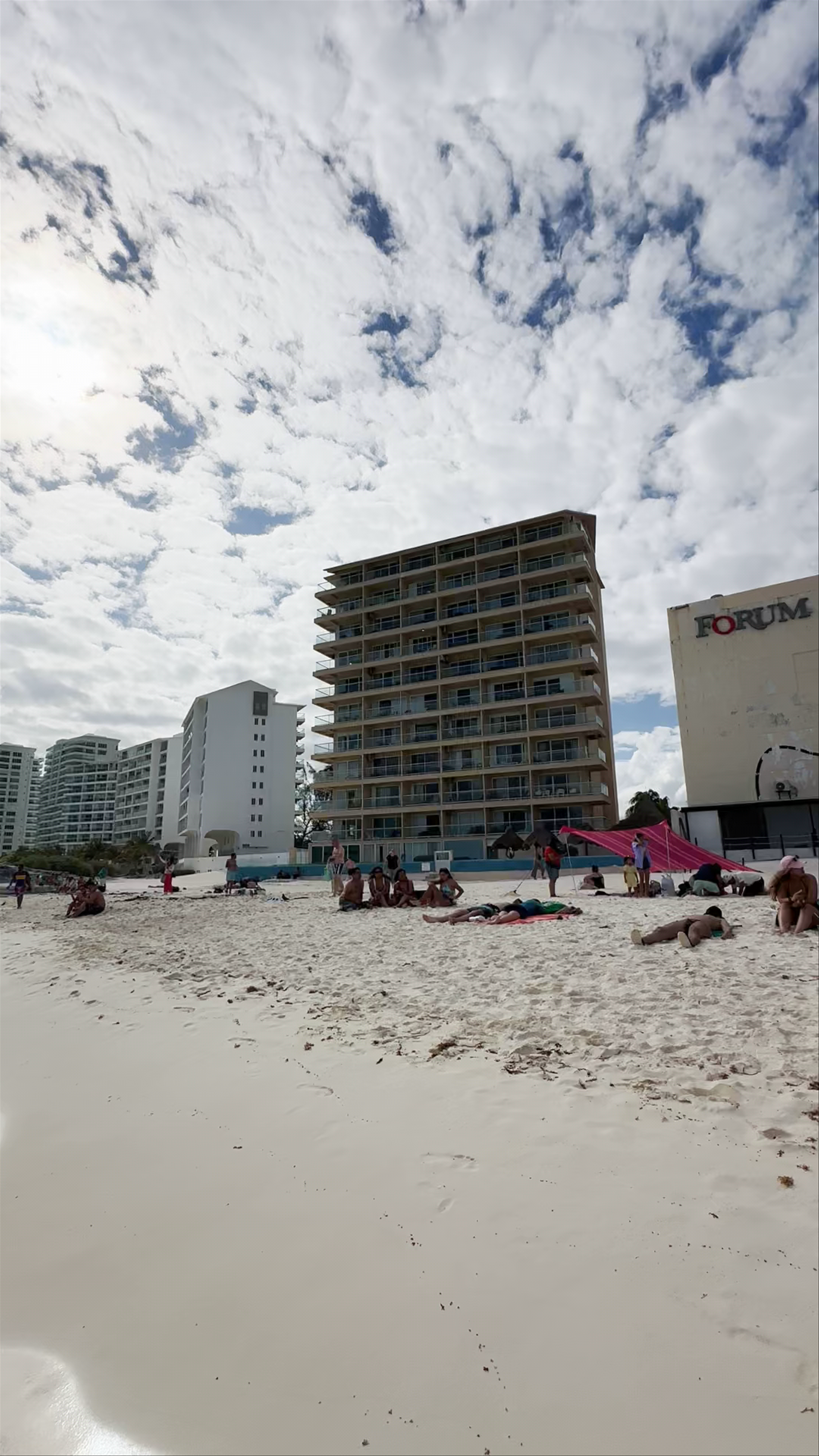 Vibrant Beach Life at Playa Forum, Cancún
