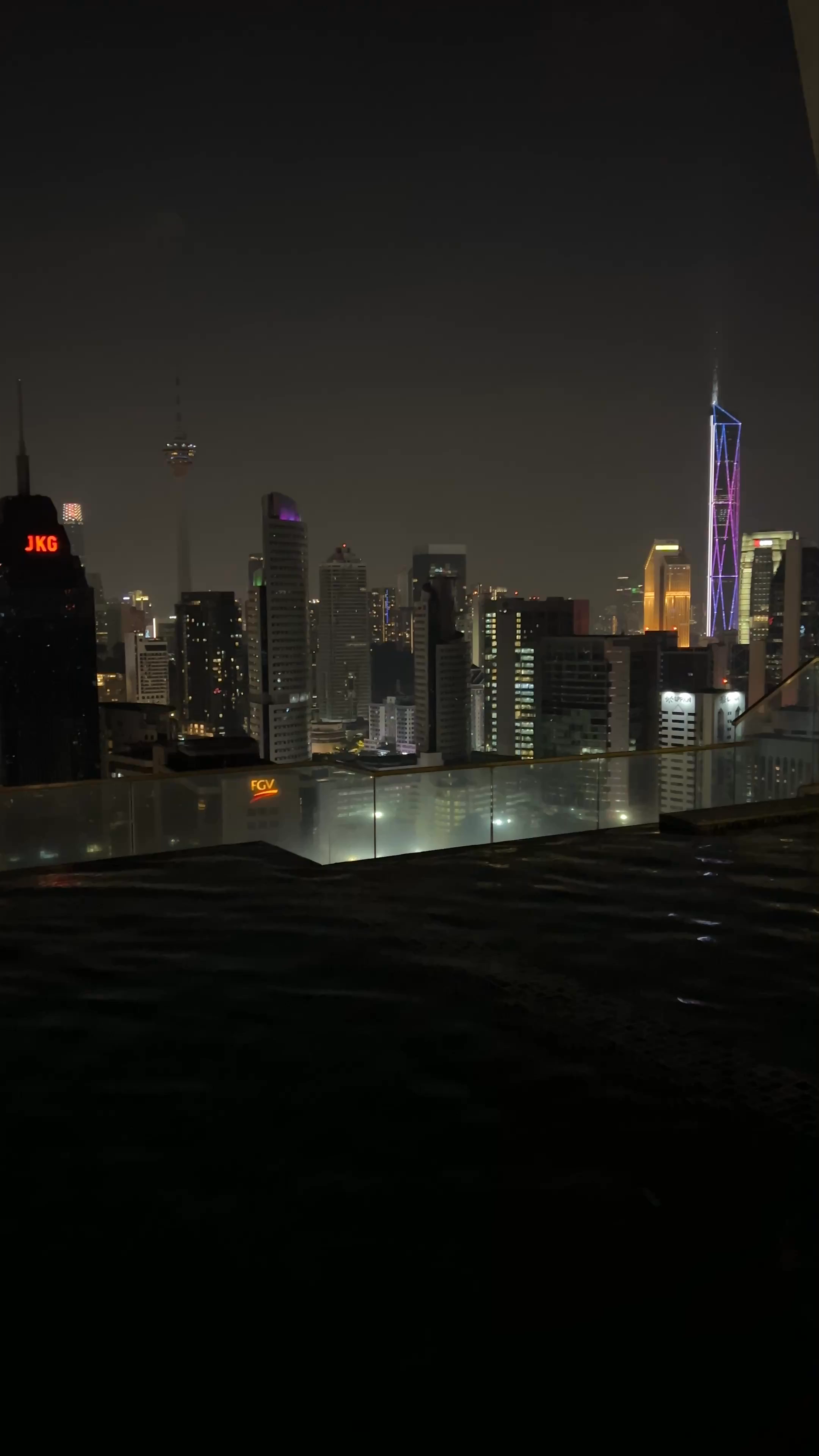 Regalia Residence The Sky Pool Suite: Nighttime Kuala Lumpur Skyline Views