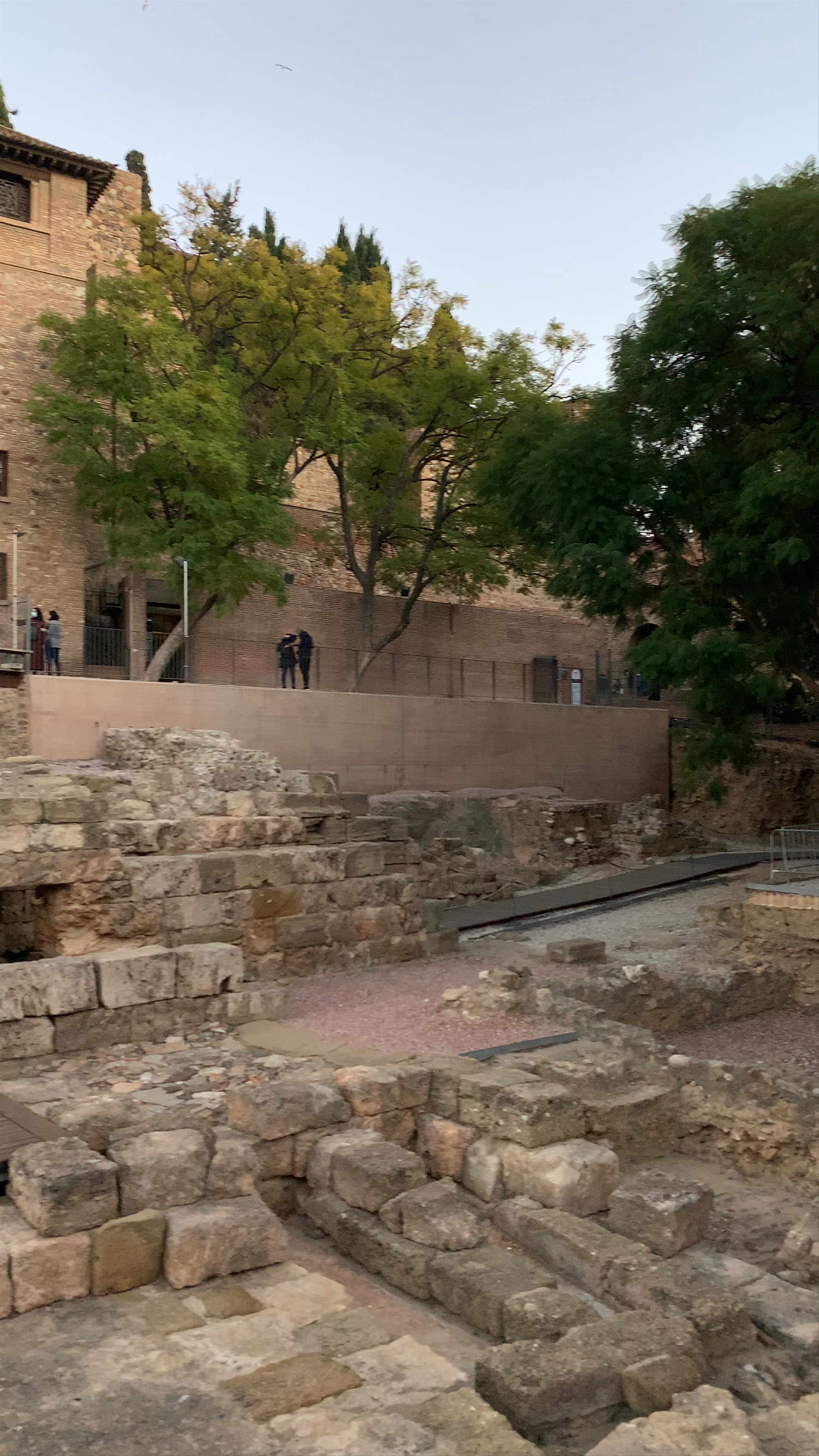Explore the Ancient Teatro Romano of Málaga at Sunset