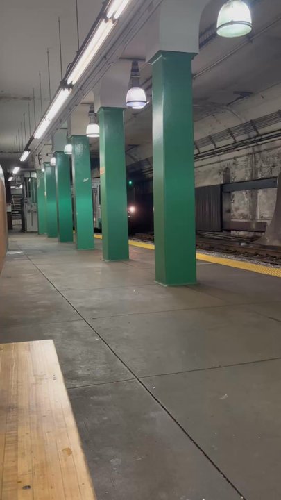 MBTA - Hynes Convention Center - Train coming into the outbound station - Public Transportation Near Me - Boston, Massachusetts