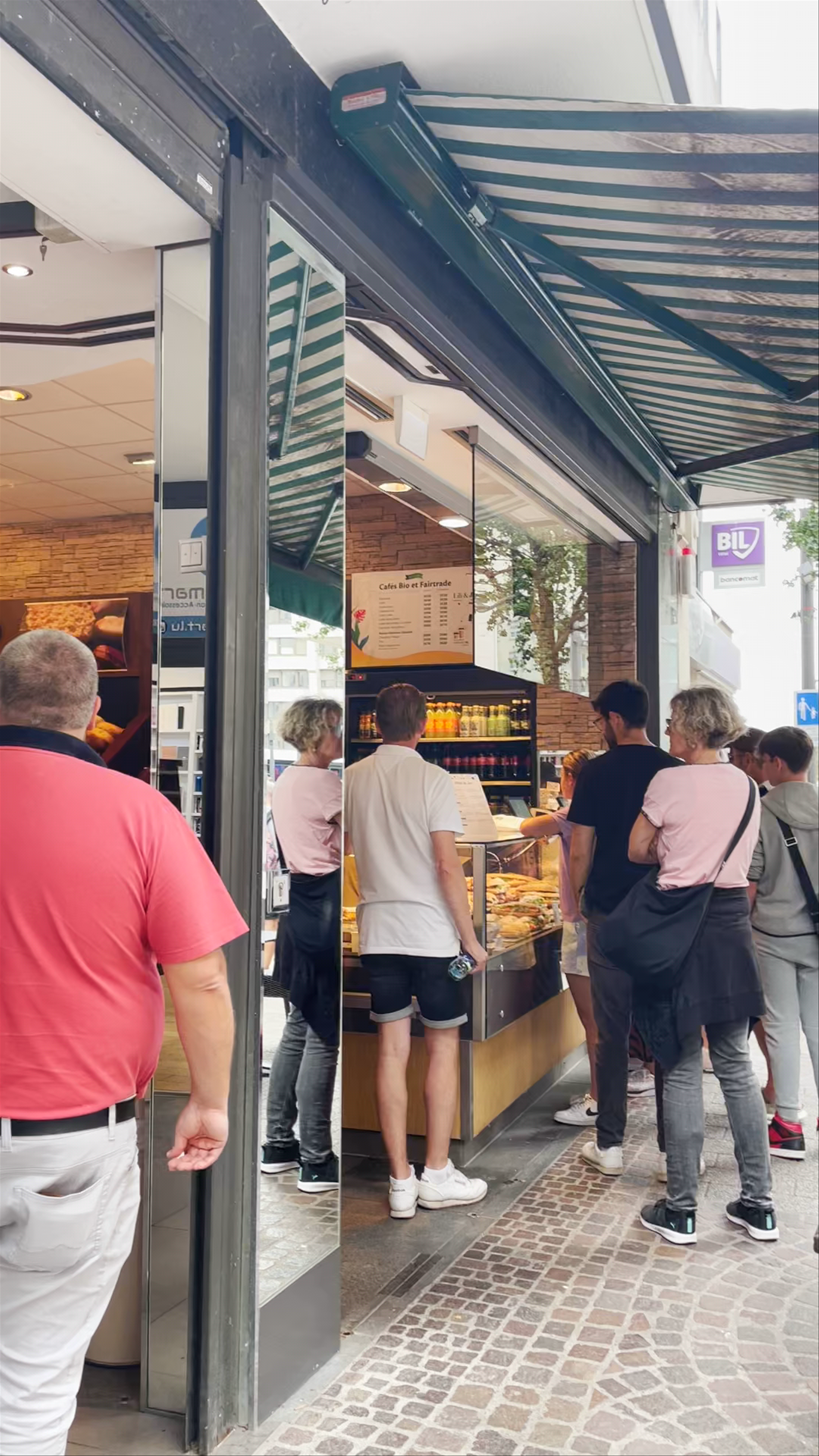 Vibrant Street Cafe Scene on Rue Jules Fischer, Luxembourg