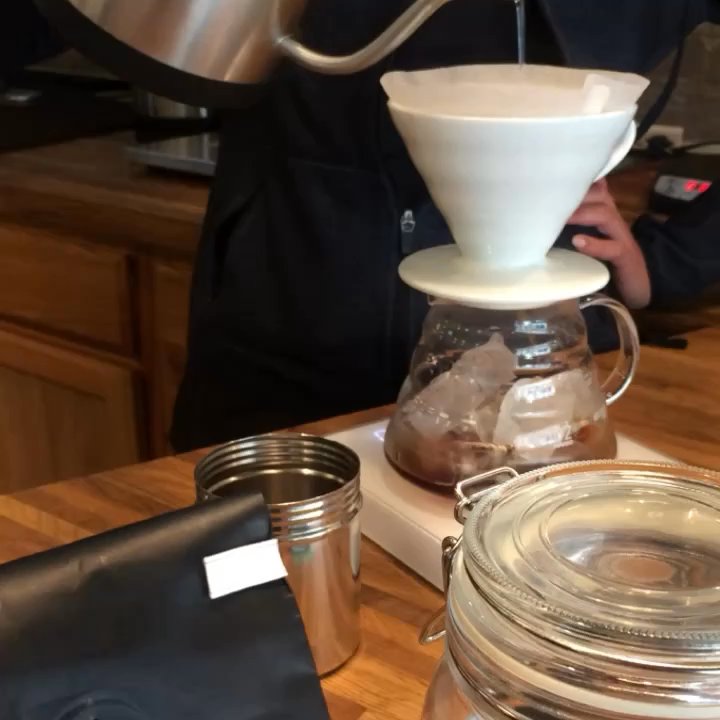 Caffeine Roasters - Emily doing work - Coffee & Tea Near Me - Tampa, Florida