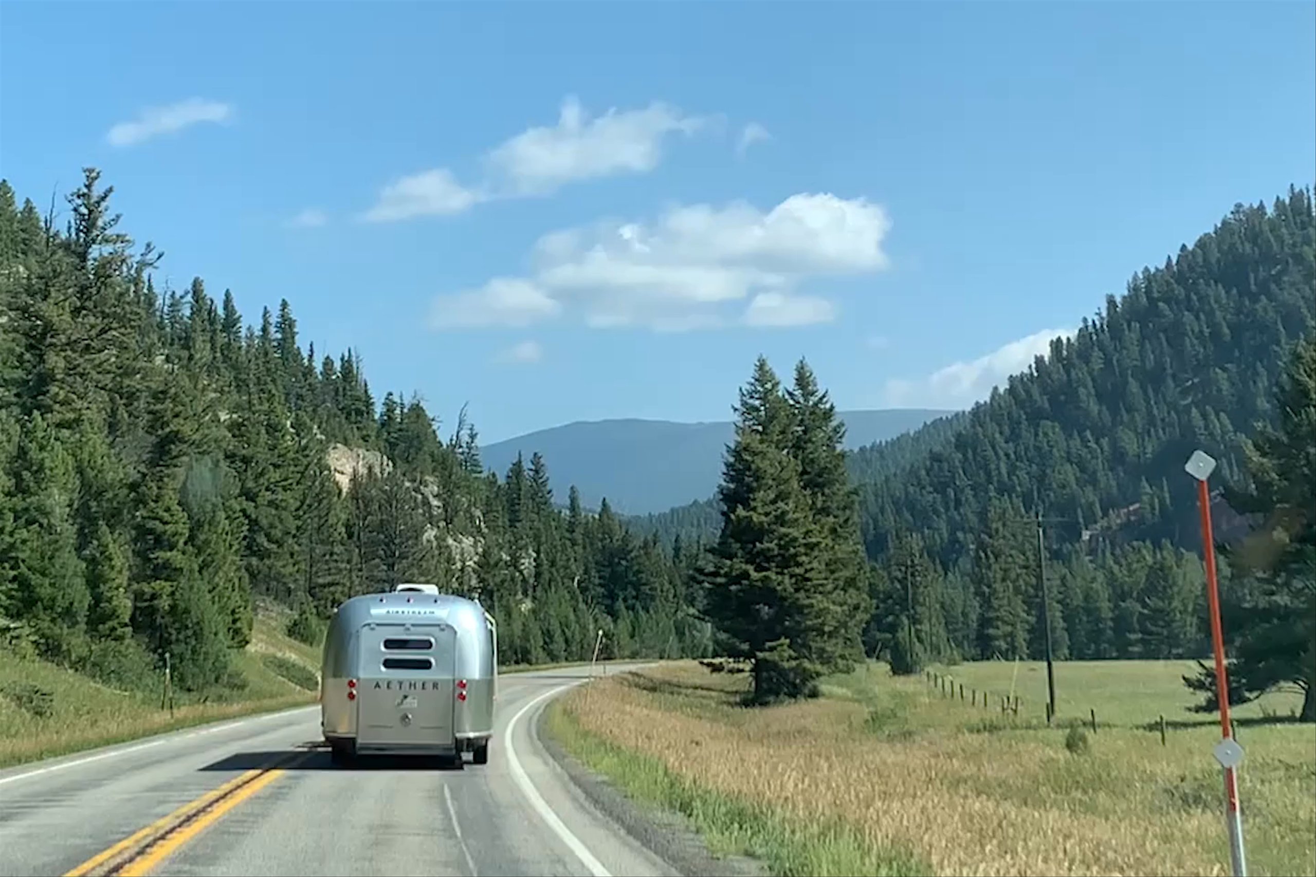 Video of AETHERstream driving in Jackson, Wyoming with forests and mountains in the background