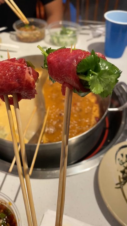 Da Bin Jia - My faves - pickled veggies on the left and cilantro on the right (wrapped with beef) - Hot Pot Near Me - Monterey Park, California
